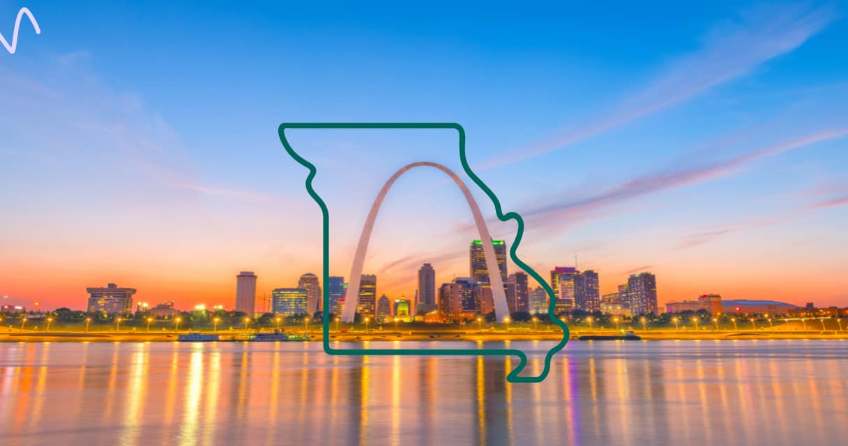 : St. Louis skyline at sunset with Gateway Arch, symbolizing financial solutions for healthcare workers in Missouri.